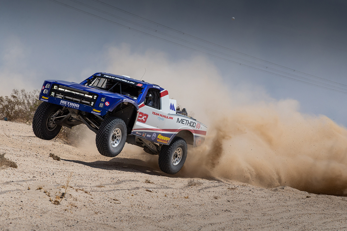 Dan McMillin's trophy truck offroad on Method Race Wheels 202 Forged Bead Grip wheels.