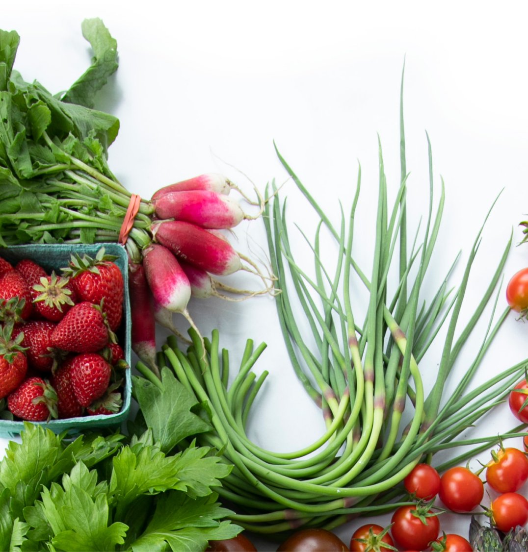 fresh produce including radishes and scallions