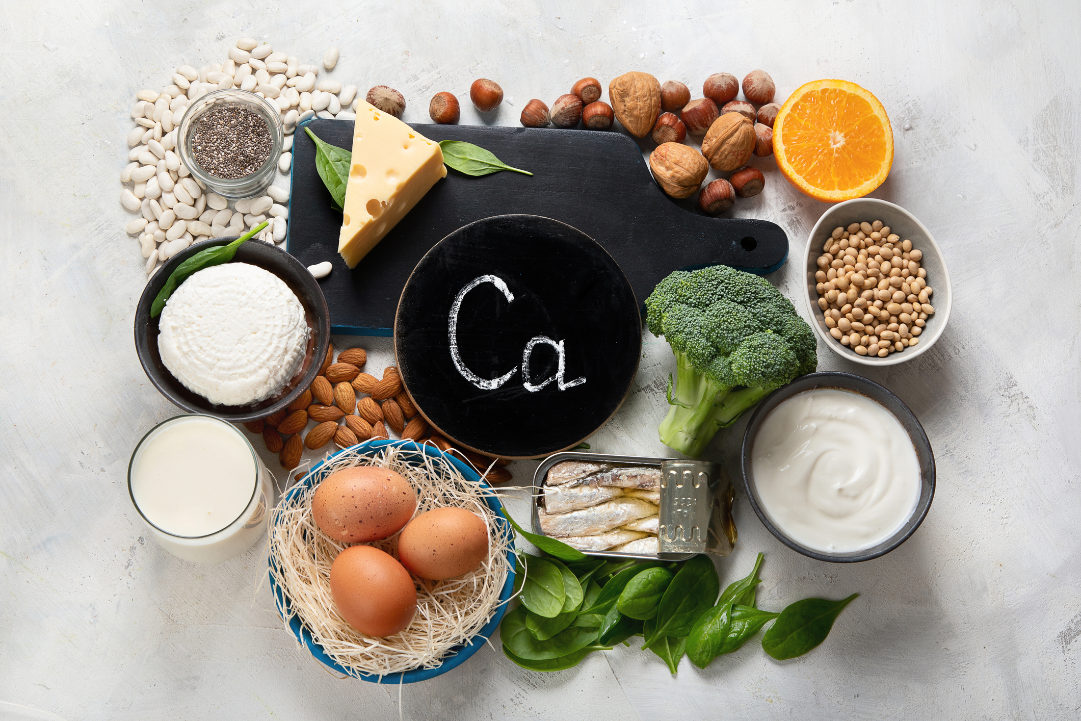 Foods high in calcium such as cheese and broccoli.