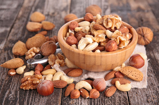 A bowl of mixed nuts, which make great pregnancy snacks.
