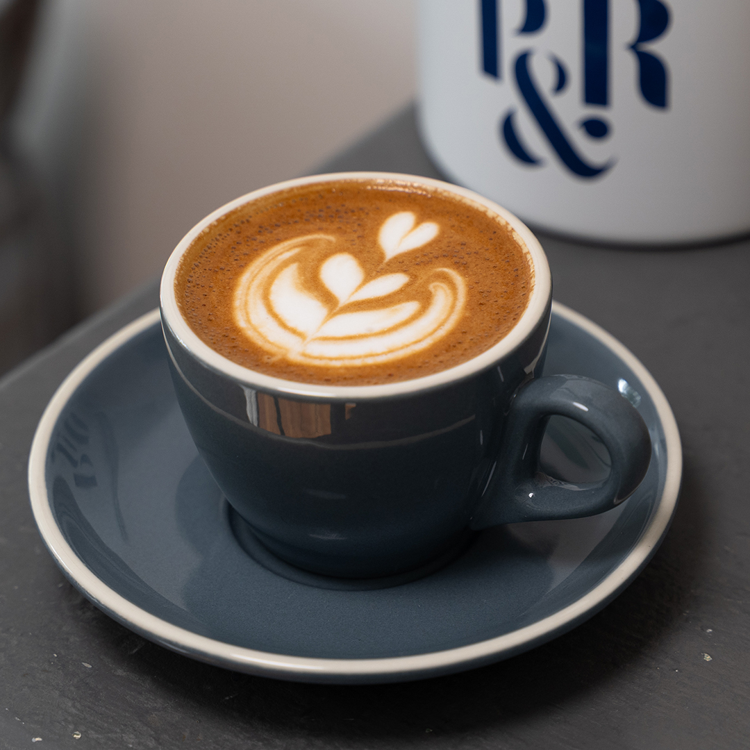 cup of flat white coffee