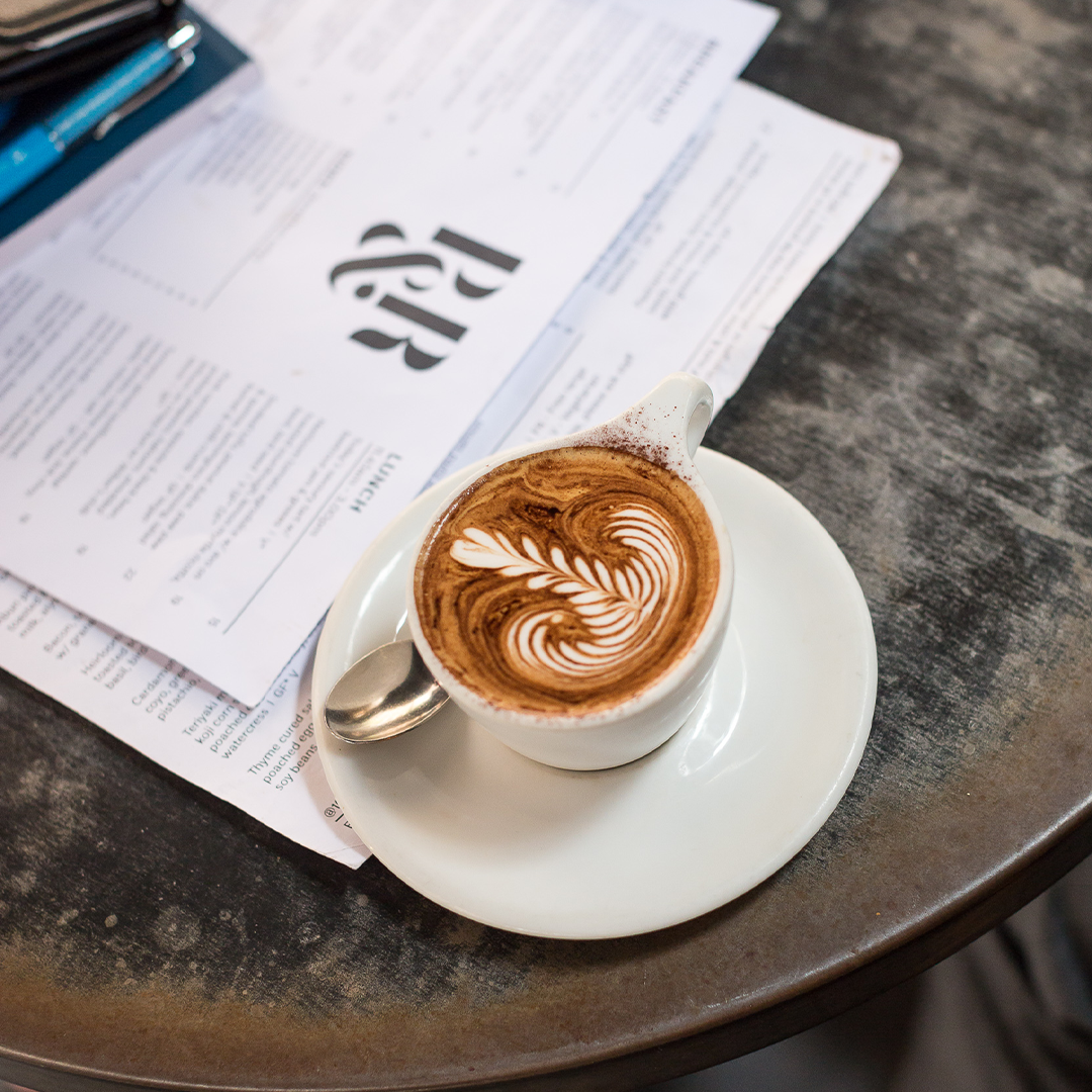 Freshly brewed P&R Coffee with latte art