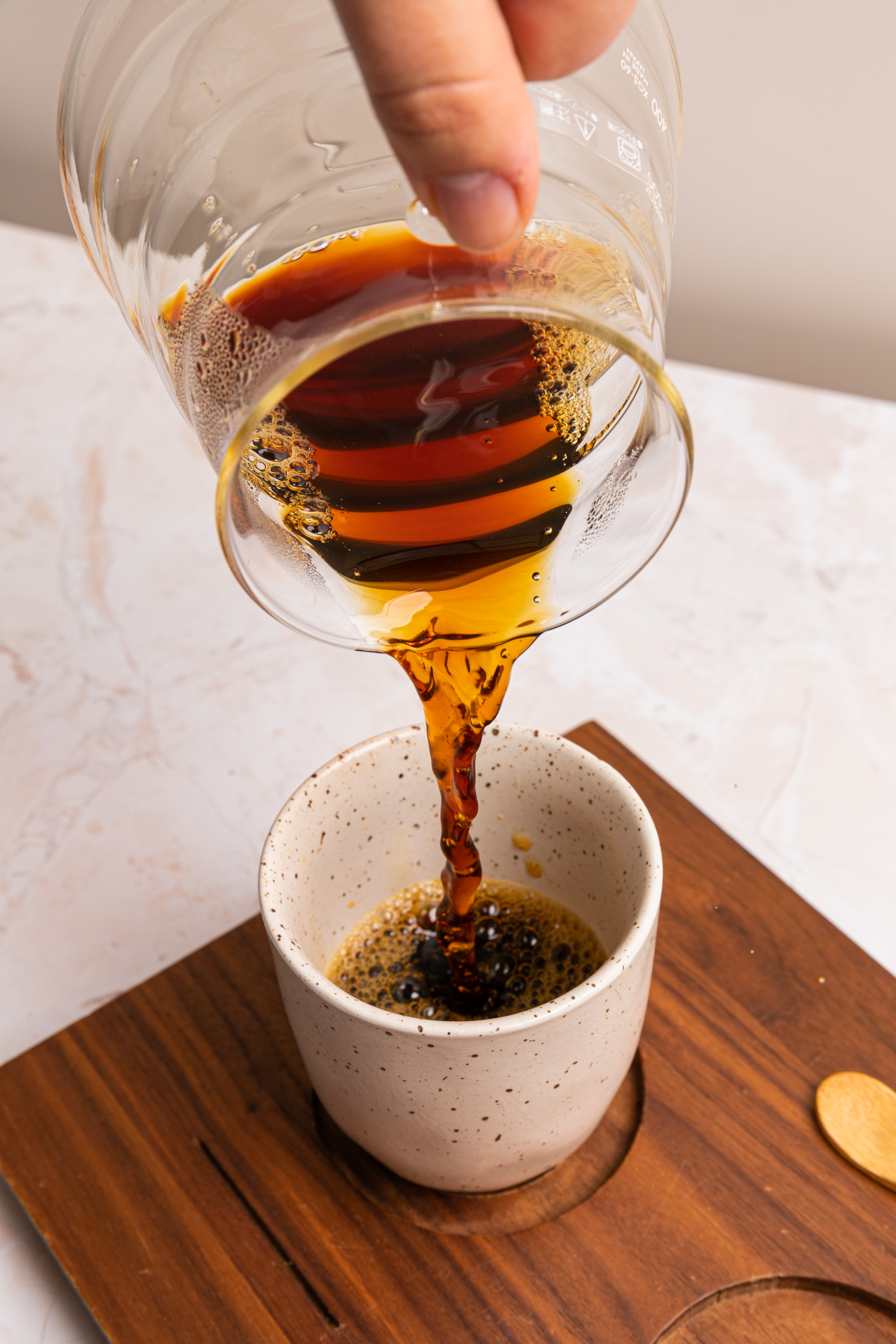 Expedition coffee being poured into a mug from a Hario V60 jug