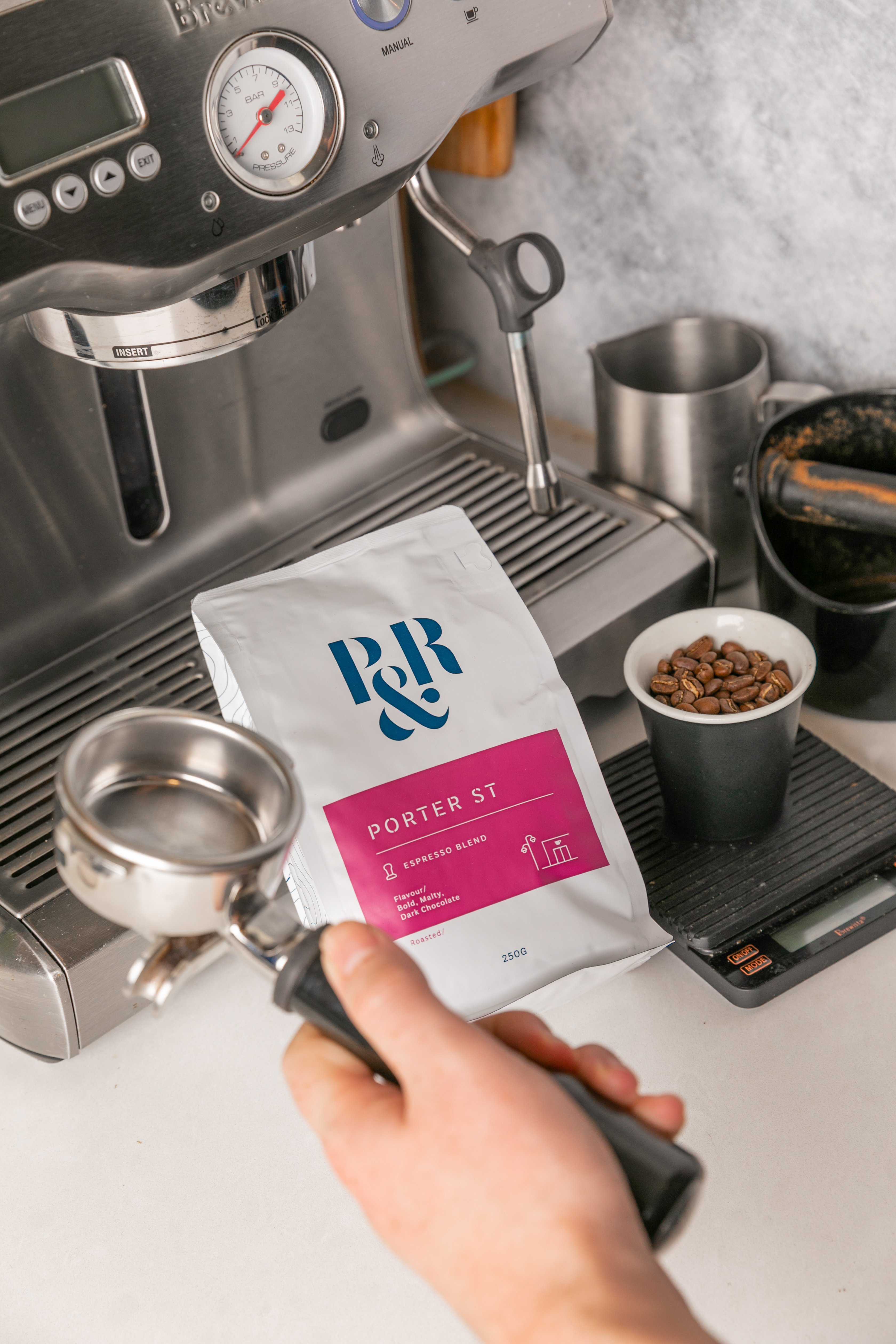 Pablo and Rusty's Porter St blend resting on a Breville espresso machine