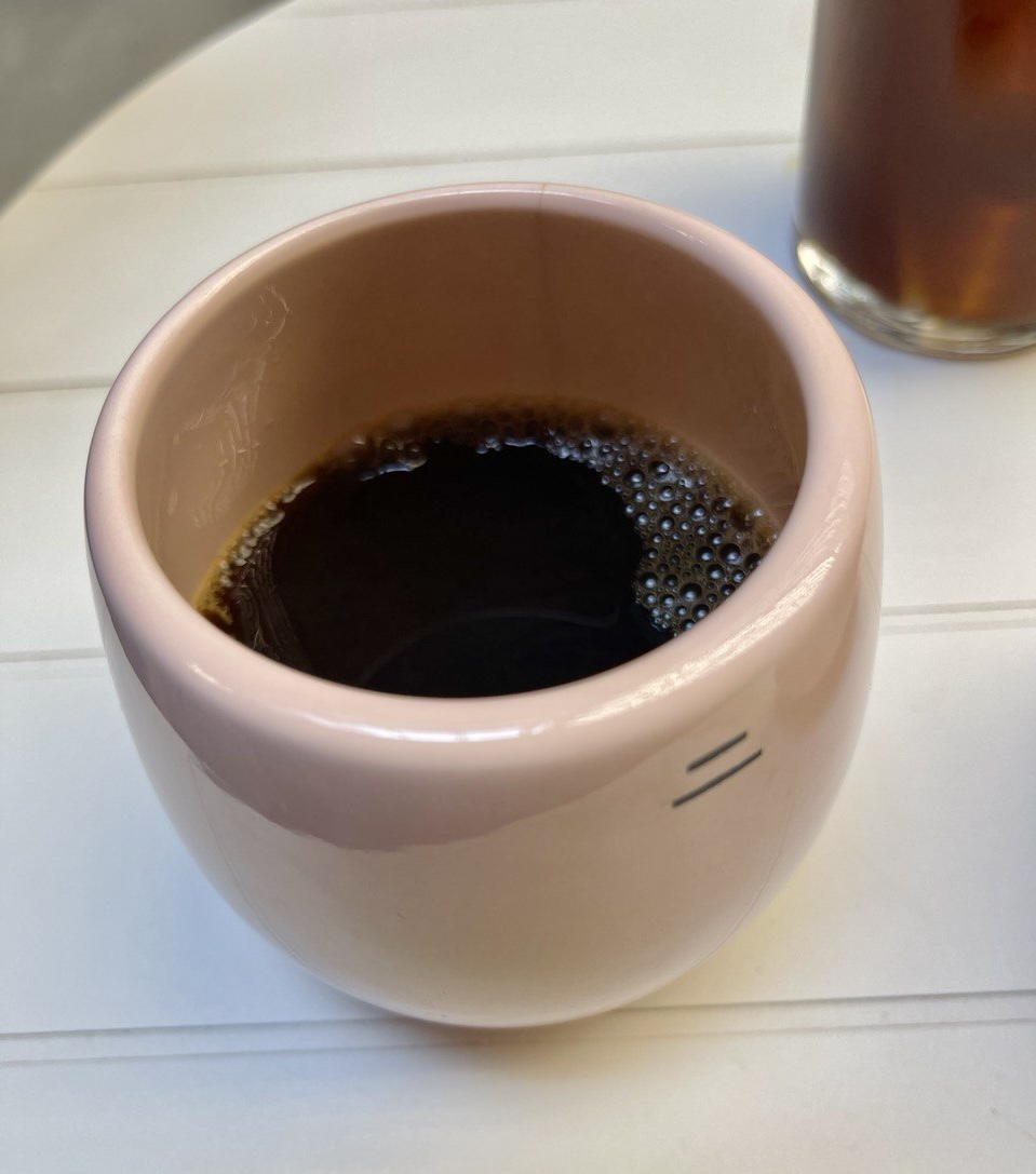 Ceramic cup with coffee