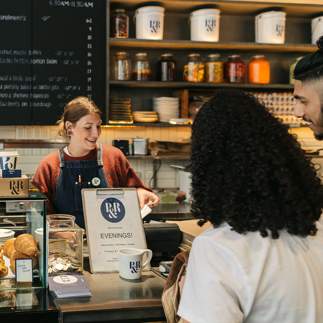 P&R 161 cafe staff serving customers