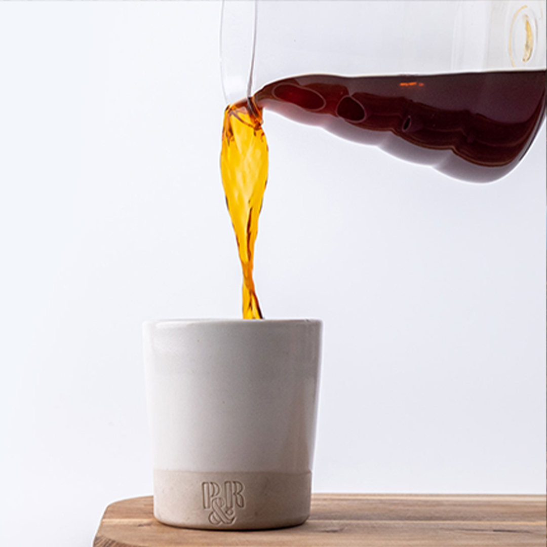 pouring coffee into a cup