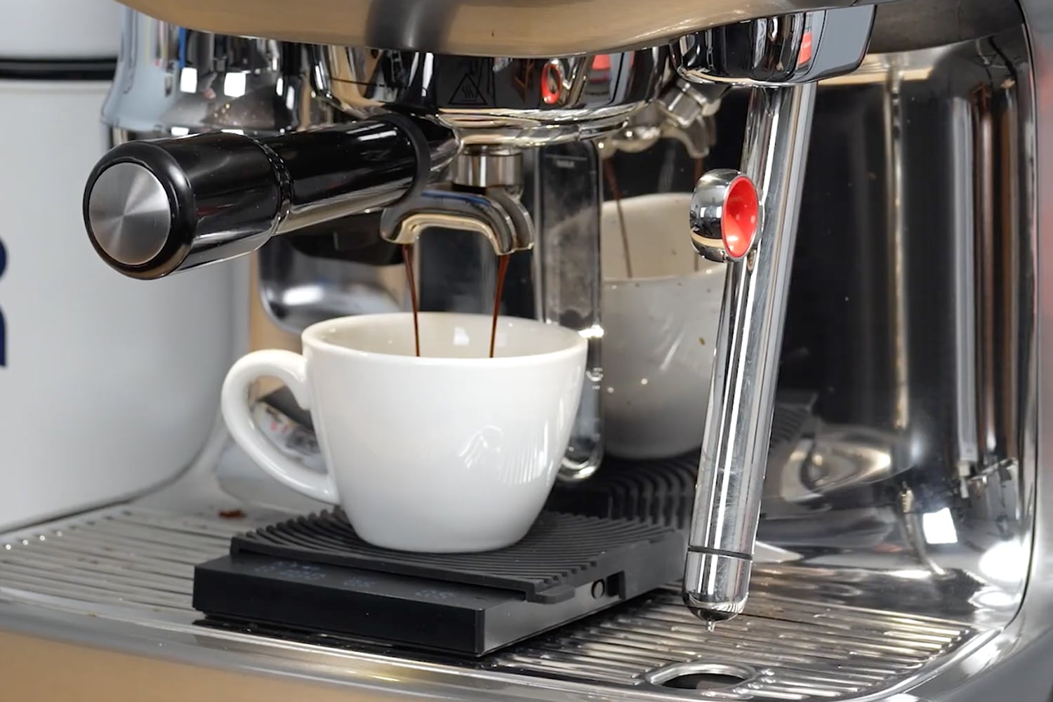 weighing espresso on a scale