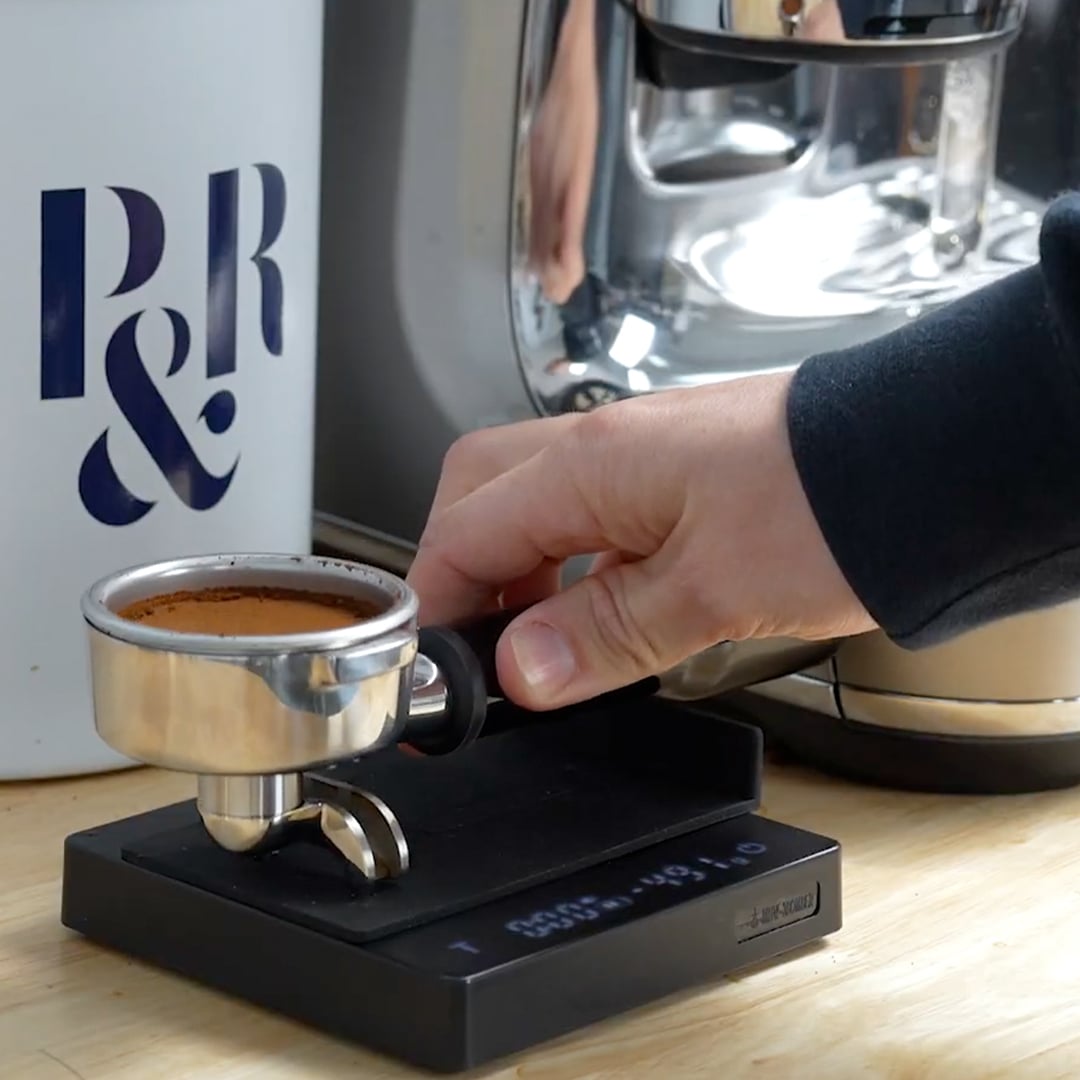 weighing coffee on a scale