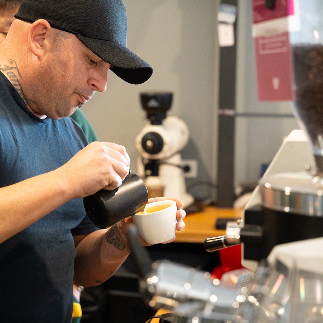 man preparing coffee