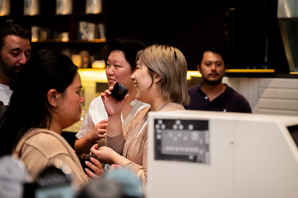 Guests mingling enjoying delicious coffee 