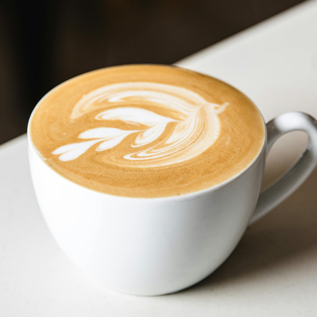 cup of flat white coffee