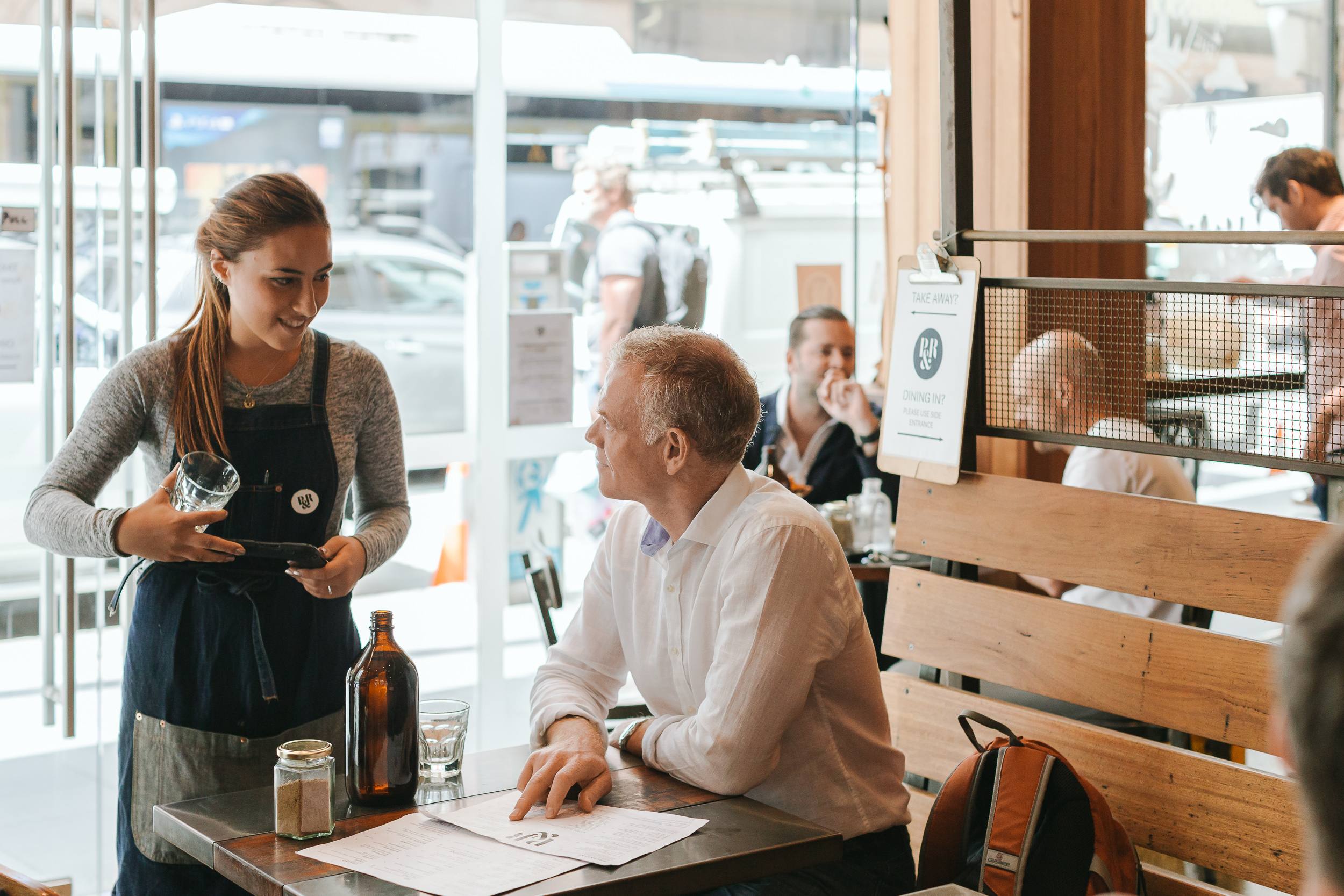 P&R 161 cafe staff serving a customer