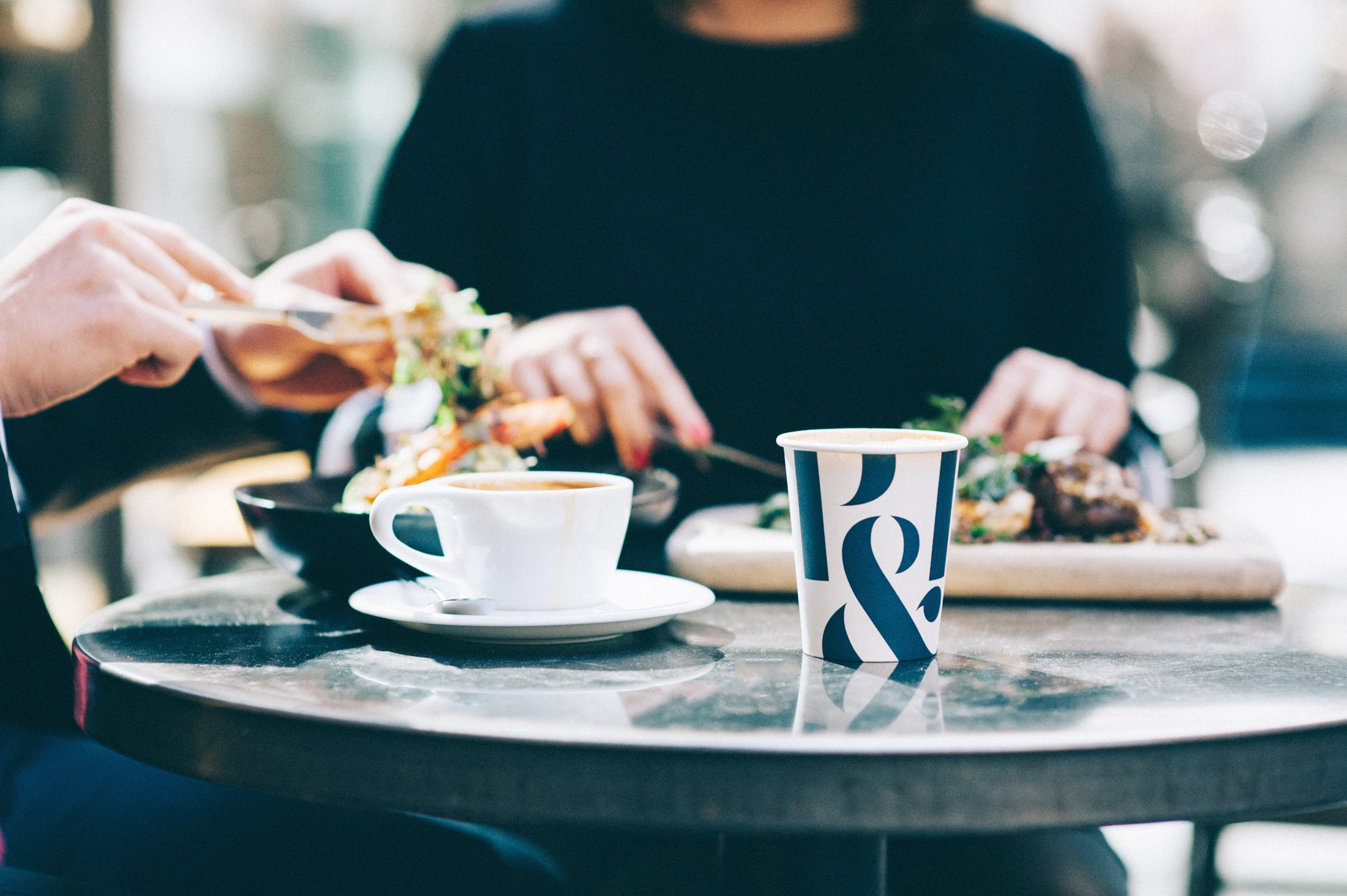 Customers having breakfast with P&R coffee 