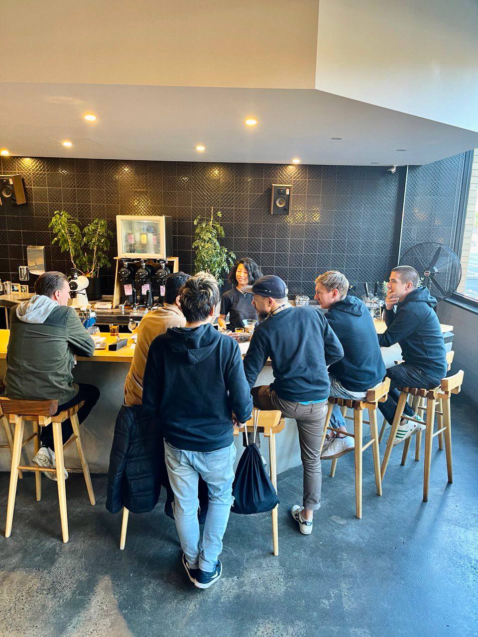 Team enjoying coffee at a Melbourne coffee shop 