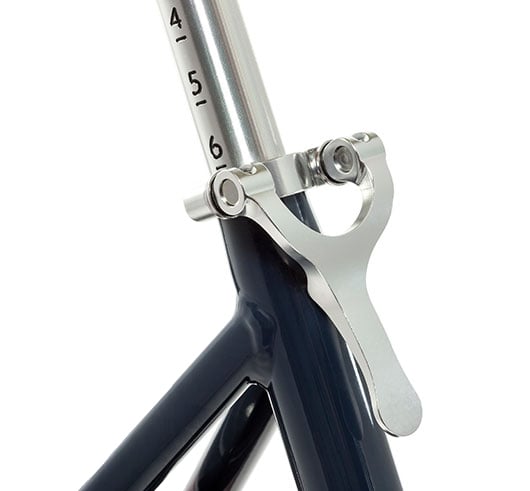 Close-up of trike seat post clamp adjustment handle.