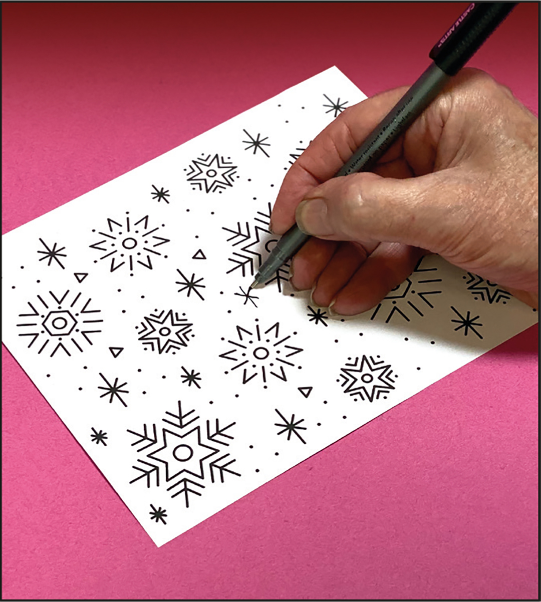 Eine handgezeichnete Schablone mit Schneeflocken, die auf eine Kerze aufgedruckt werden kann.