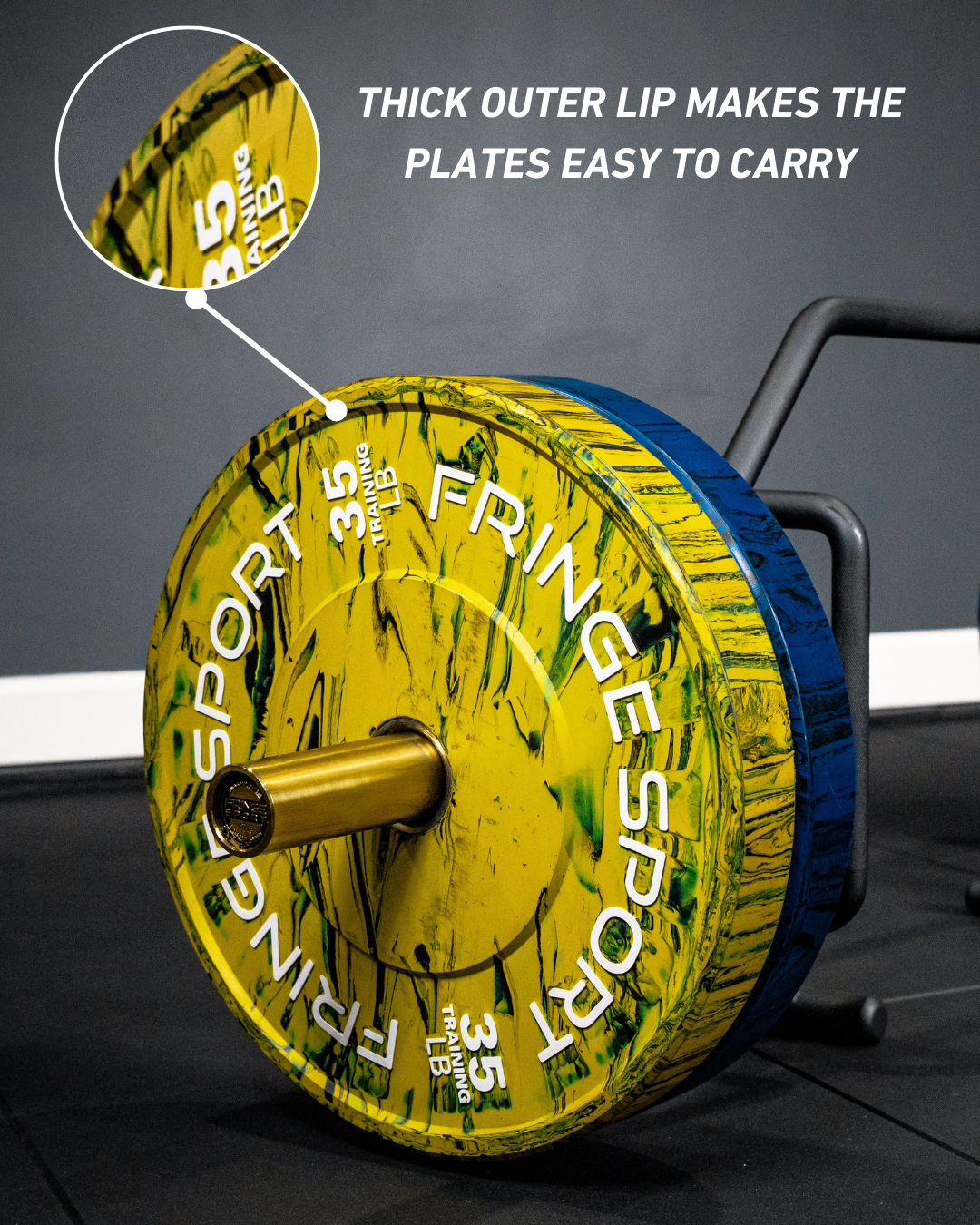 Showing the thick lip of the savage bumper plates which makes it easier to carry.