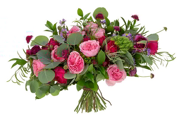 This gorgeous hand tied bouquet features pink and red garden roses, crimson scabiosa, two kinds of eucalyptus, and Israeli ruscus.