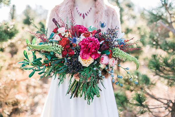 FDI graduate Meagan created this gorgeous boho style wedding bouquet in jewel colors.