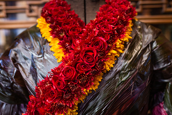 This award winning floral Chinese wedding gown trimmed in red roses and mums was created by FDI Instructor Carolyn Catron for the Ninth Moon Celebration at Lan Su Chinese Garden in Portland, Oregon.