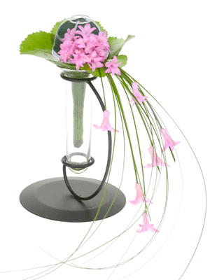 Wire bear grass together as needed and insert in the foam in individual groupings.