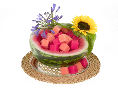 Add blue agapanthus and a sunflower to a watermelon rind filled with cubes.