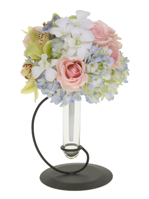Insert roses, hydrangeas, cymbidium orchids, and dendrobium orchid florets into the bouquet holder.