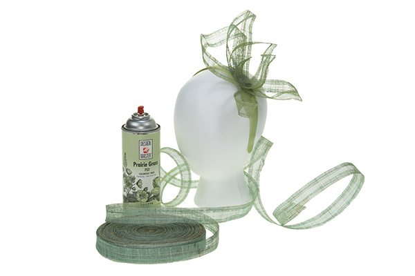 Use Design Master paint to airbrush the floral fascinator and give it a fresh green color.