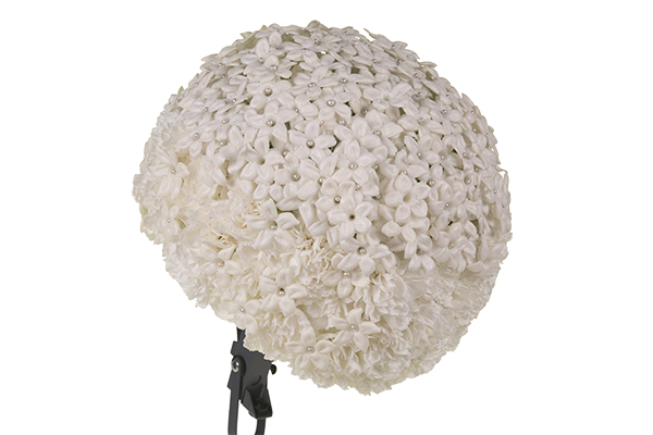 Take a few stephanotis blooms and work them in through the carnation base.