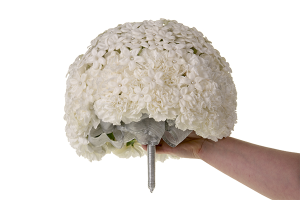 Finish the bouquet with soft ribbon or fresh leaves to help conceal any mechanics.