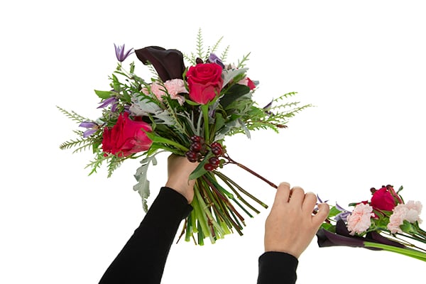 Adding Hypericum and Grevillia to the bouquet