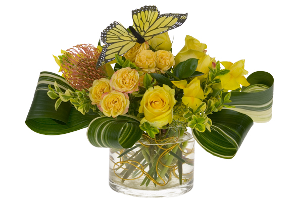 Add the yellow roses to the design and nestle a friendly butterfly among the blooms.