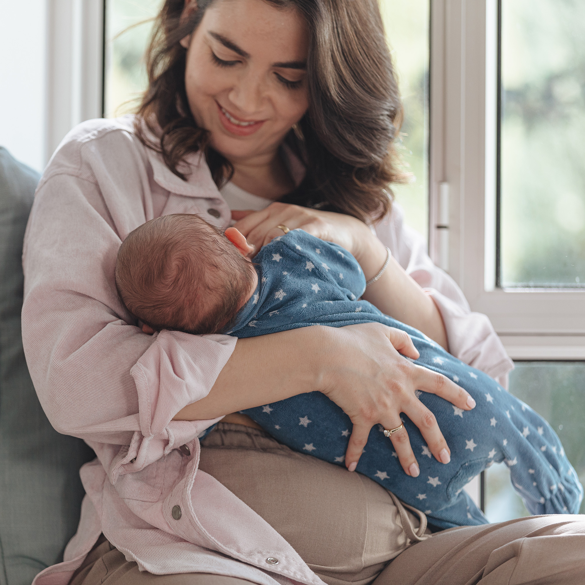 mom breastfeeding baby