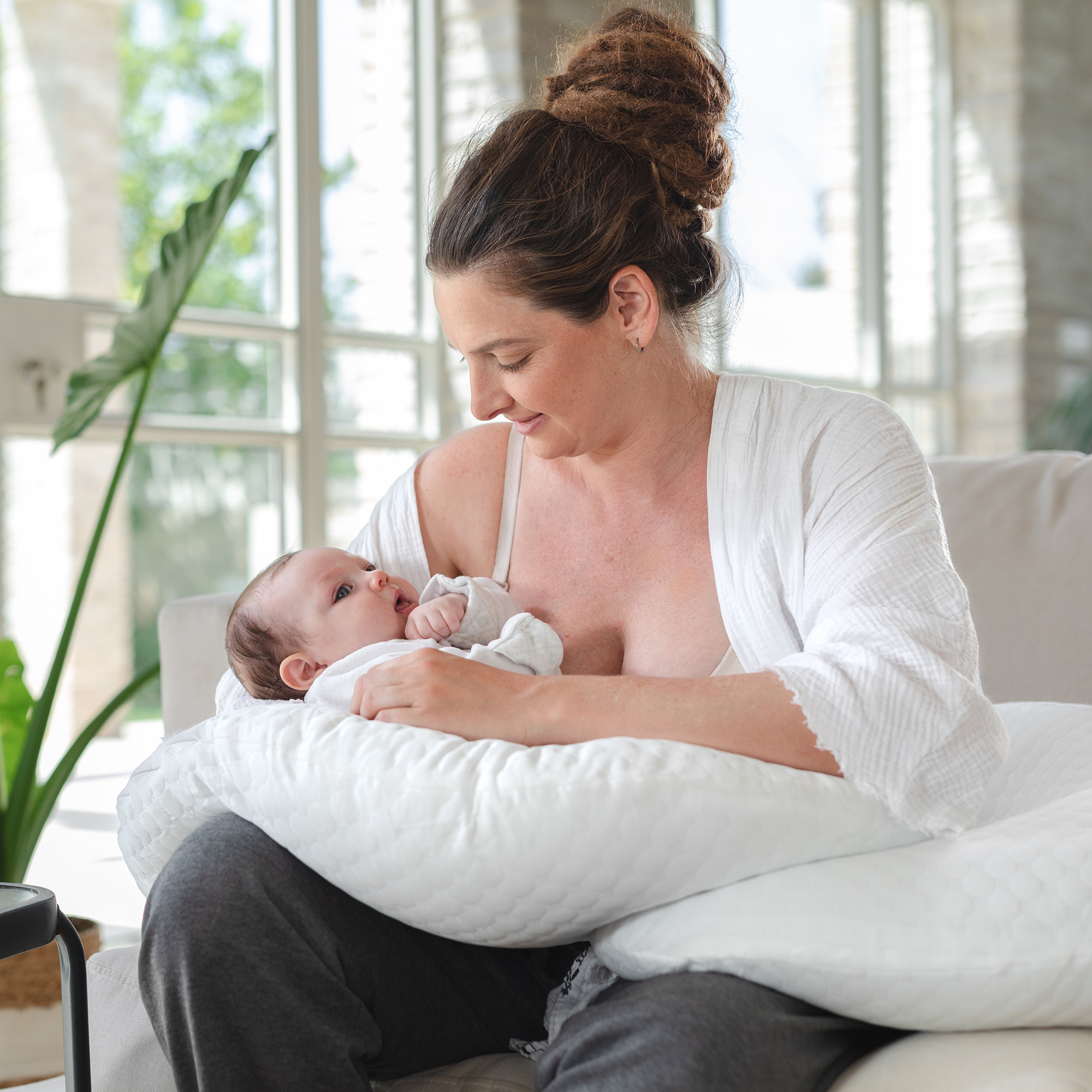 mom breastfeeding baby