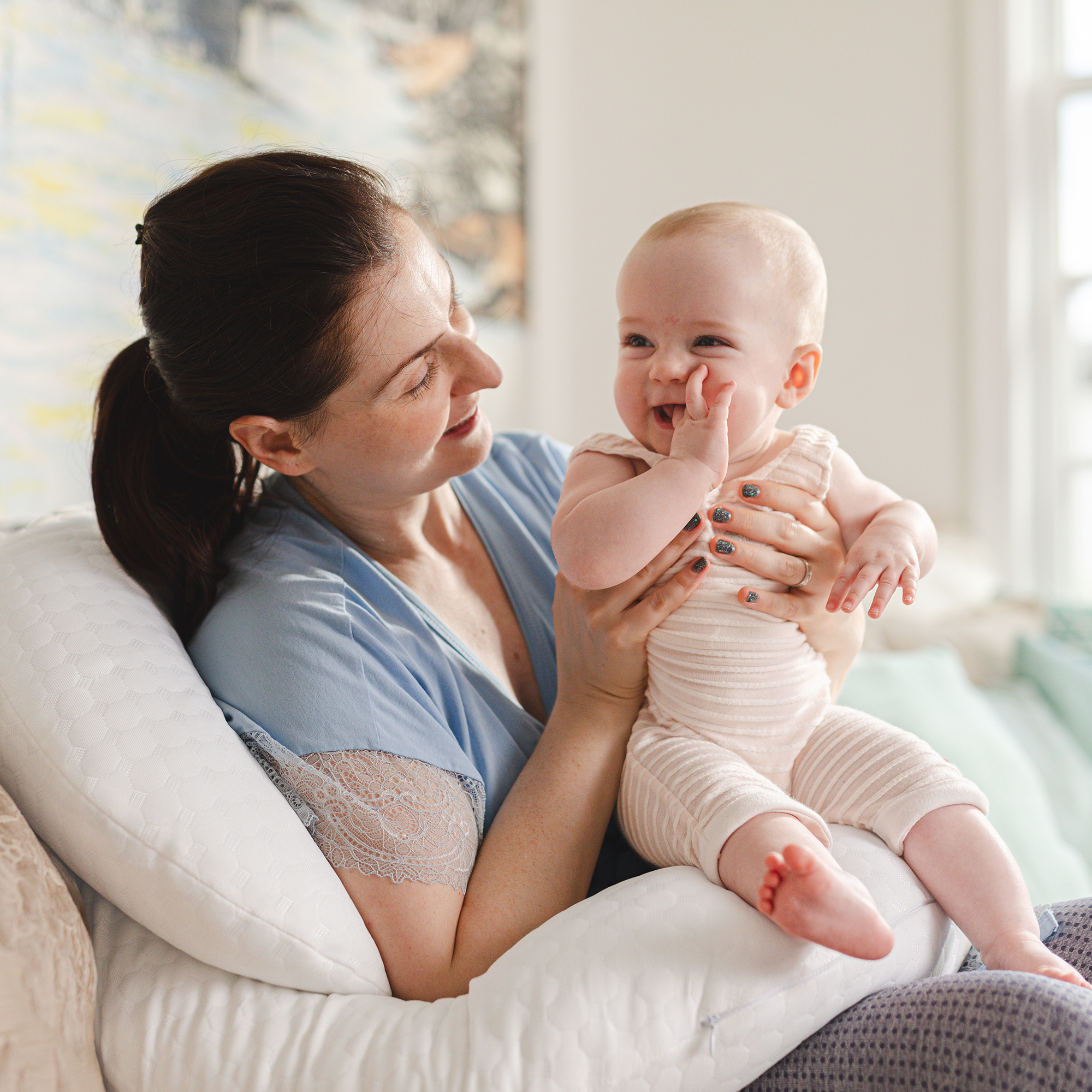 mom holding baby