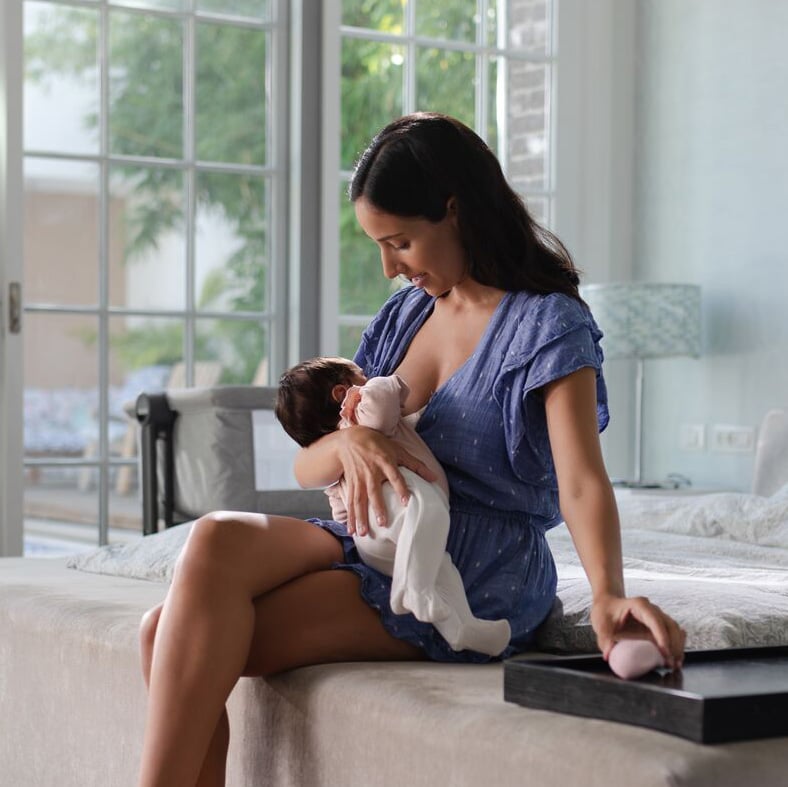 mom breastfeeding baby