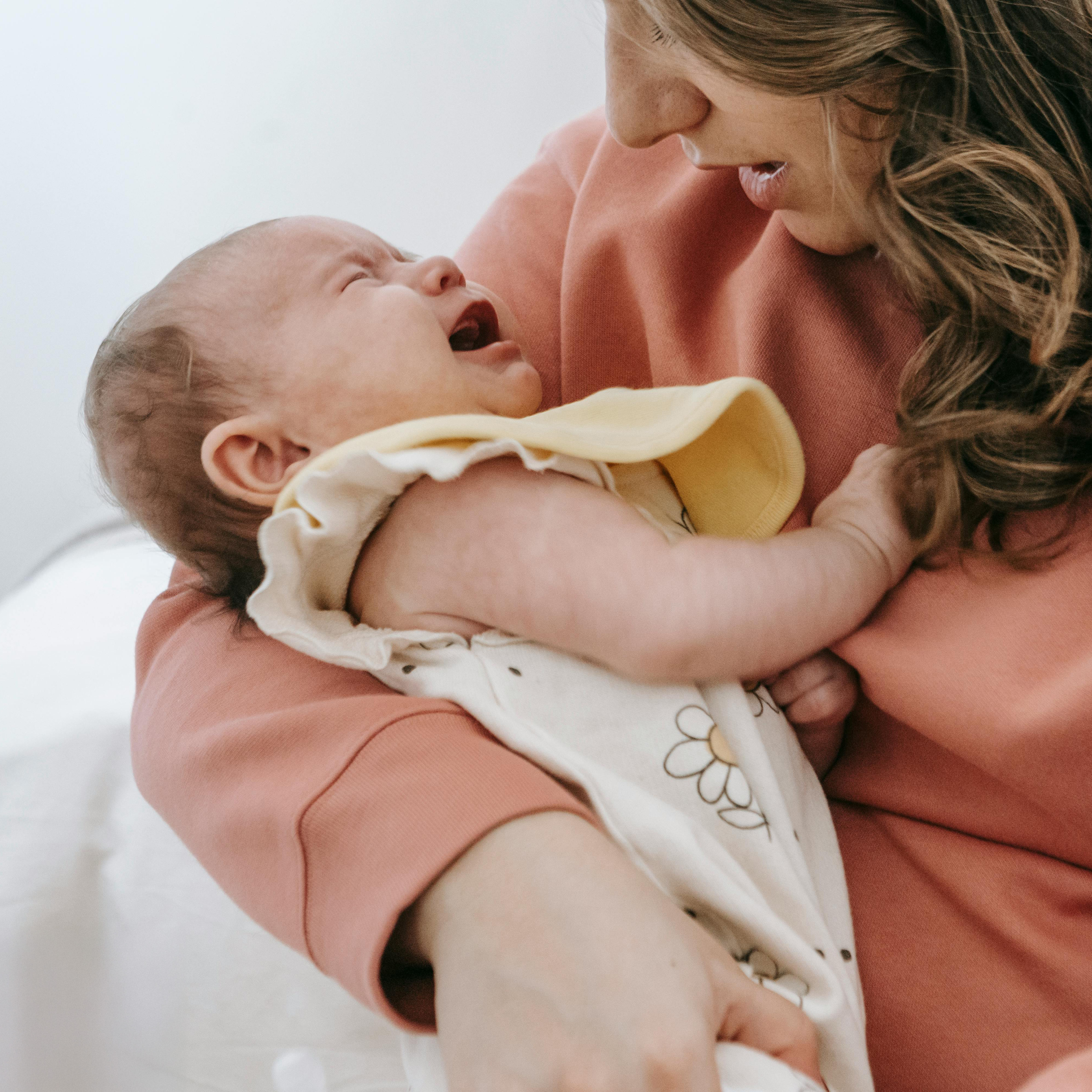 mommy consoling her baby