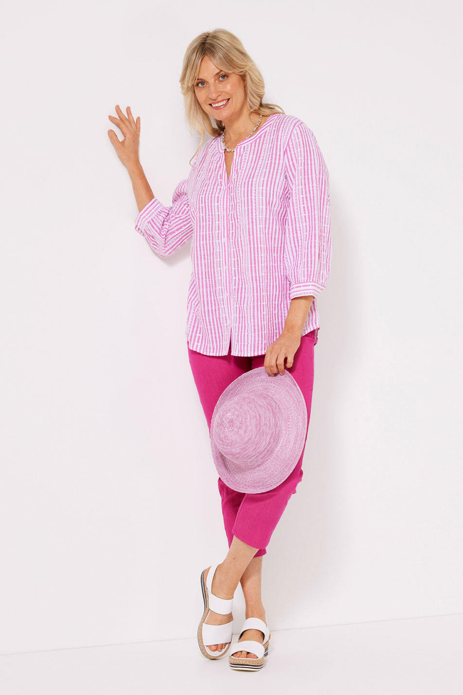 Model wearing Palermo stripe top in pink.