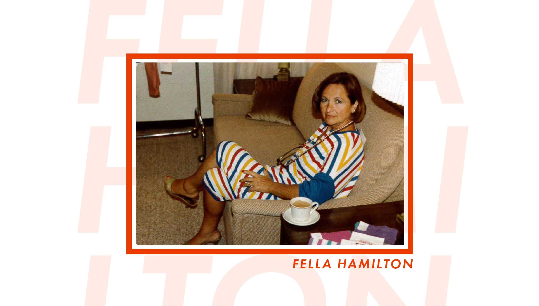Fella Hamilton sitting down on a couch with a tea.