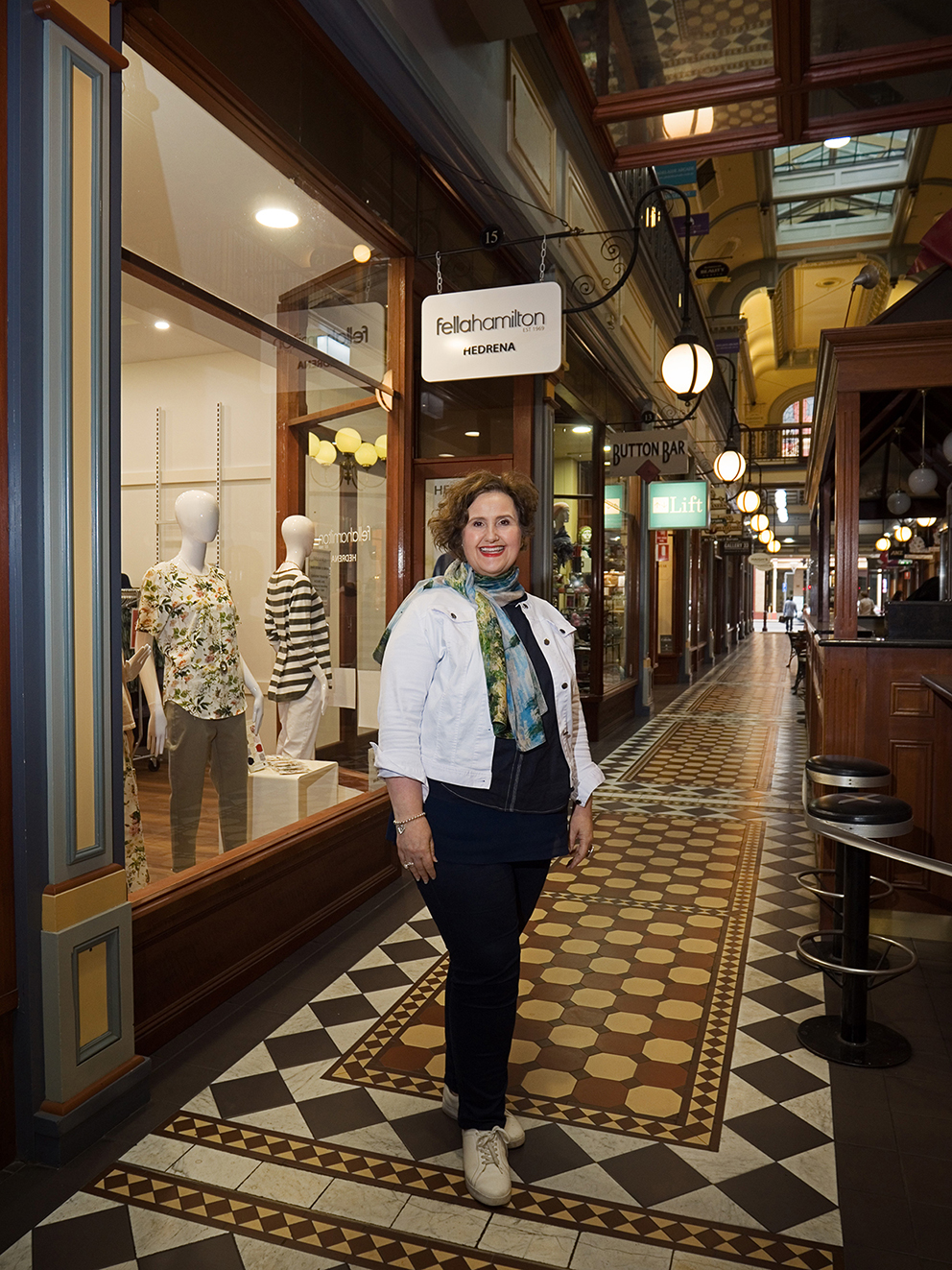 Susie posing out the front of a Fella Hamilton Store.