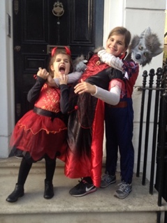 A group of people dressed up as clowns posing for the camera

Description automatically generated with low confidence