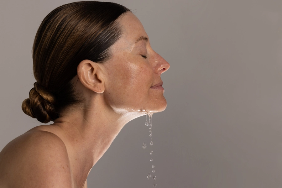 Model washing her face