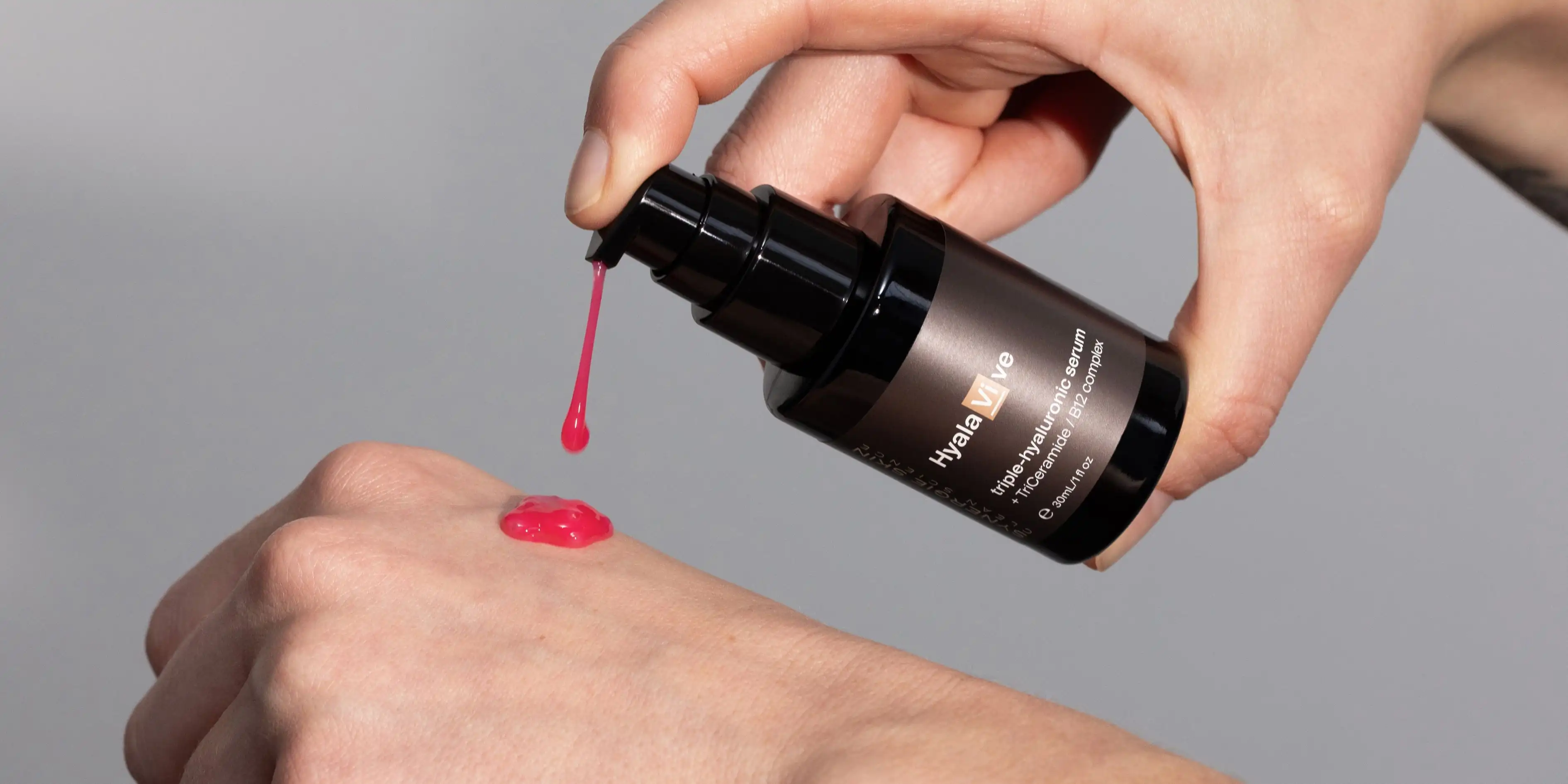 Synergie Skin's HyalaVive being pumped onto model's hand