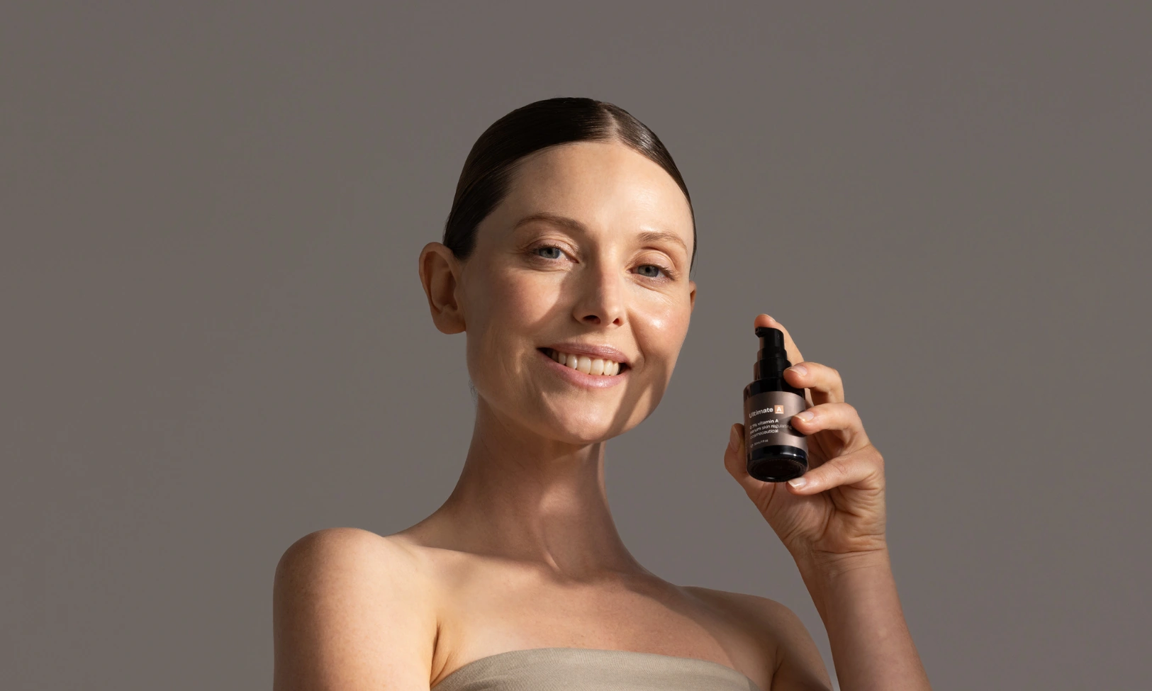 Model holding Vitamin A