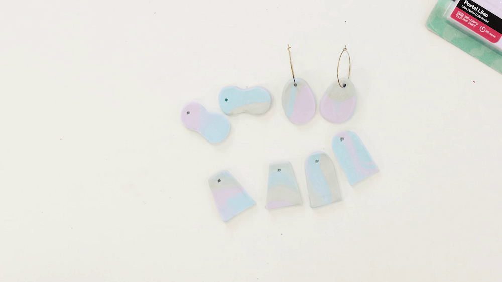 Four pairs of earrings made from  Make n Bake polymer clay, one pair with gold hoops