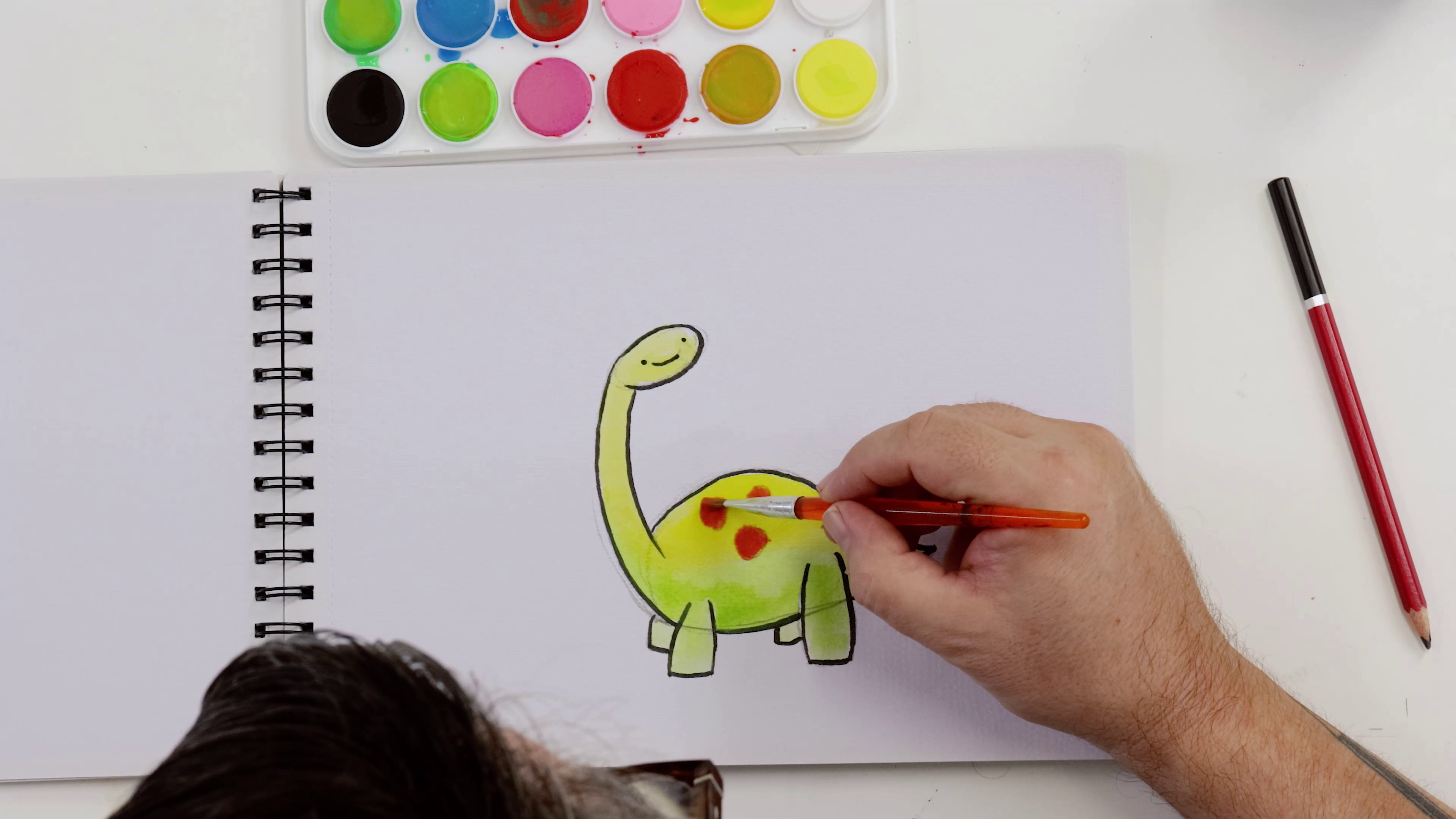 Yellowy-green brontosaurus watercolour painting with red spots