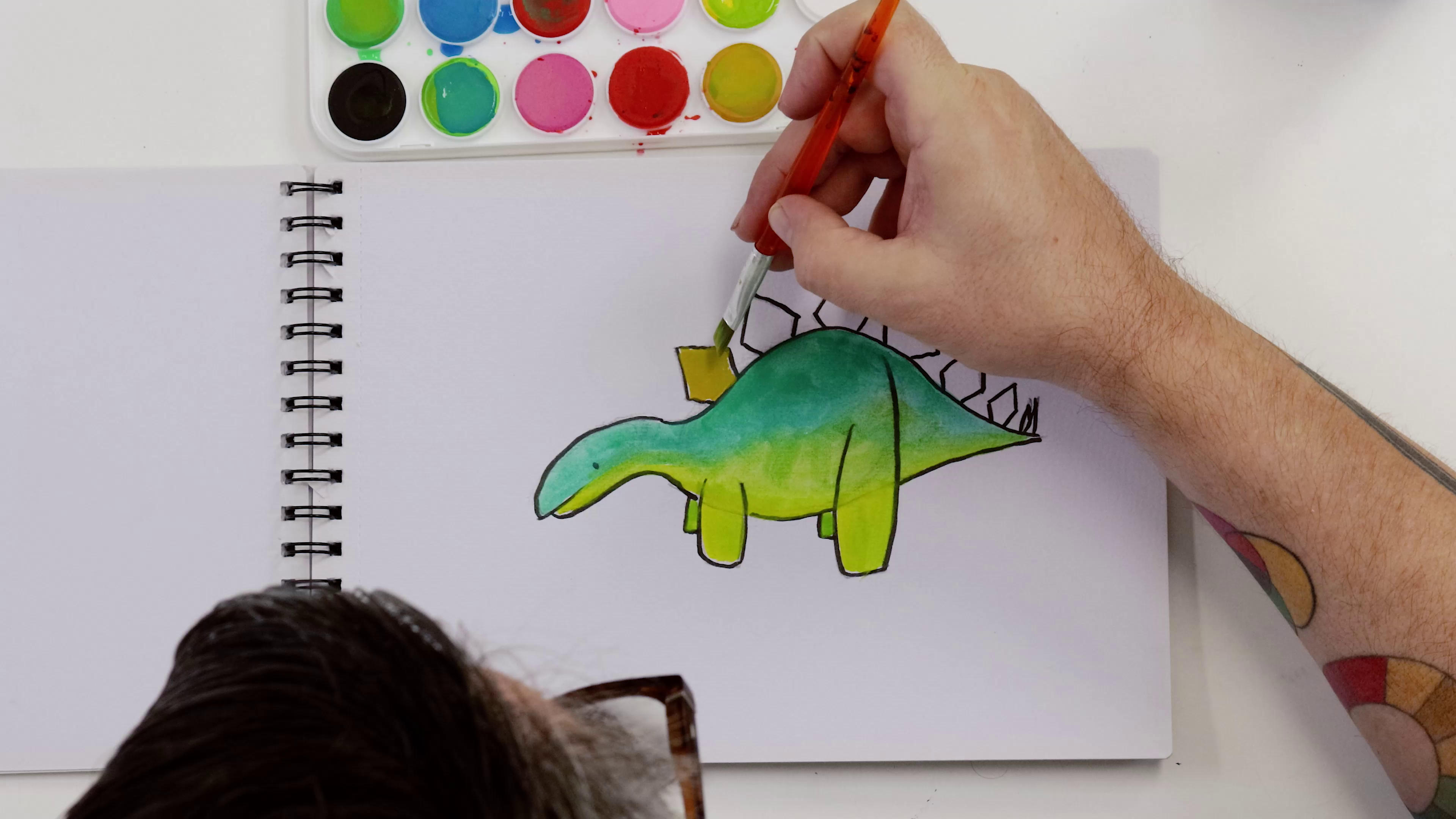 Green and lime green stegosaurus watercolour painting