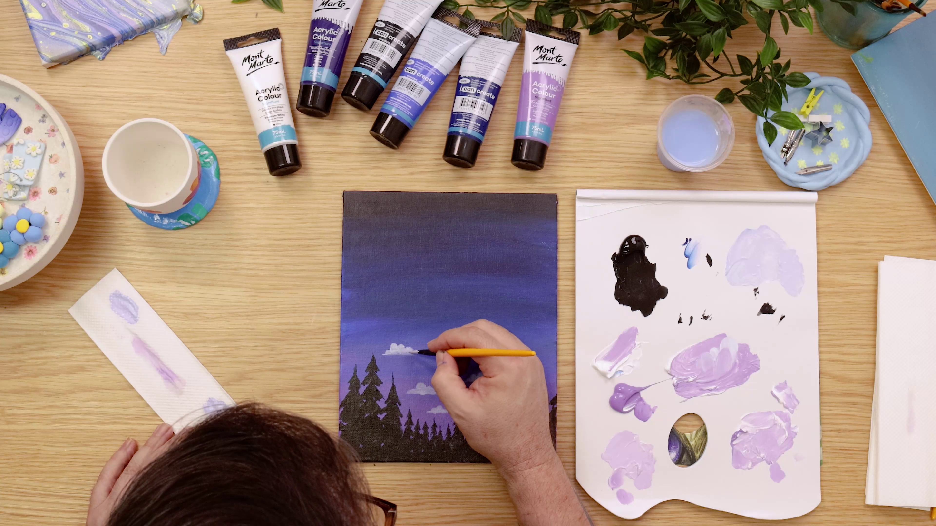 Painting in clouds on night sky gradient background