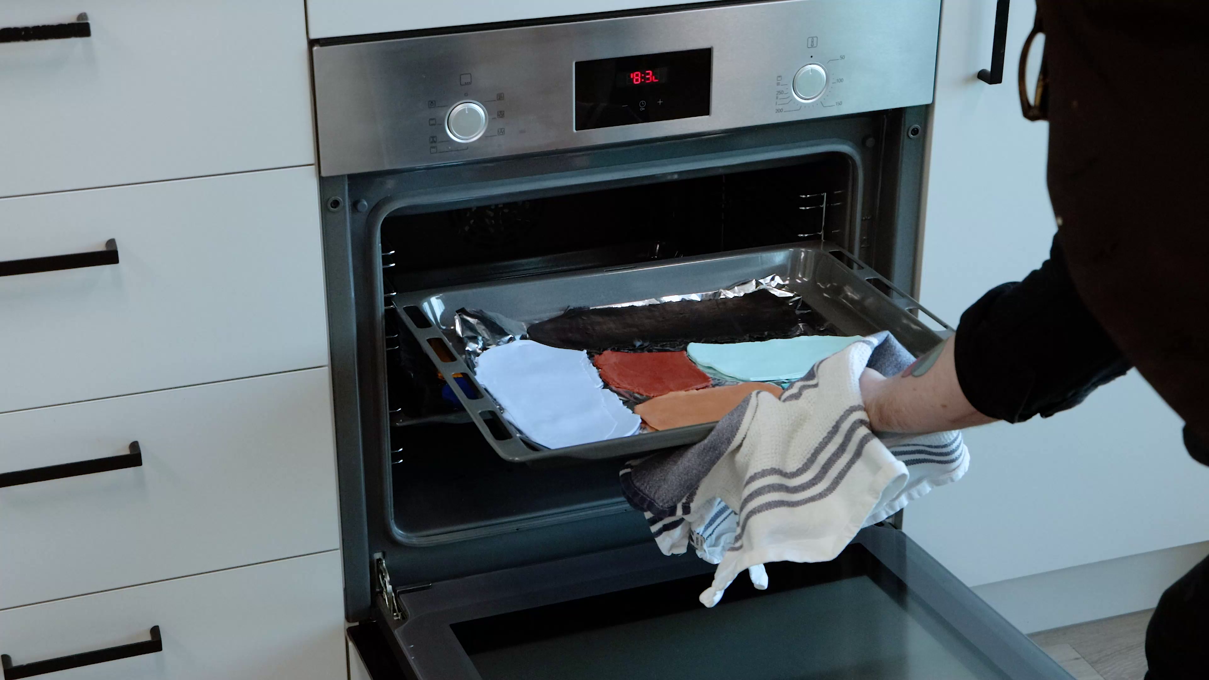 Baking sheets of polymer clay in oven